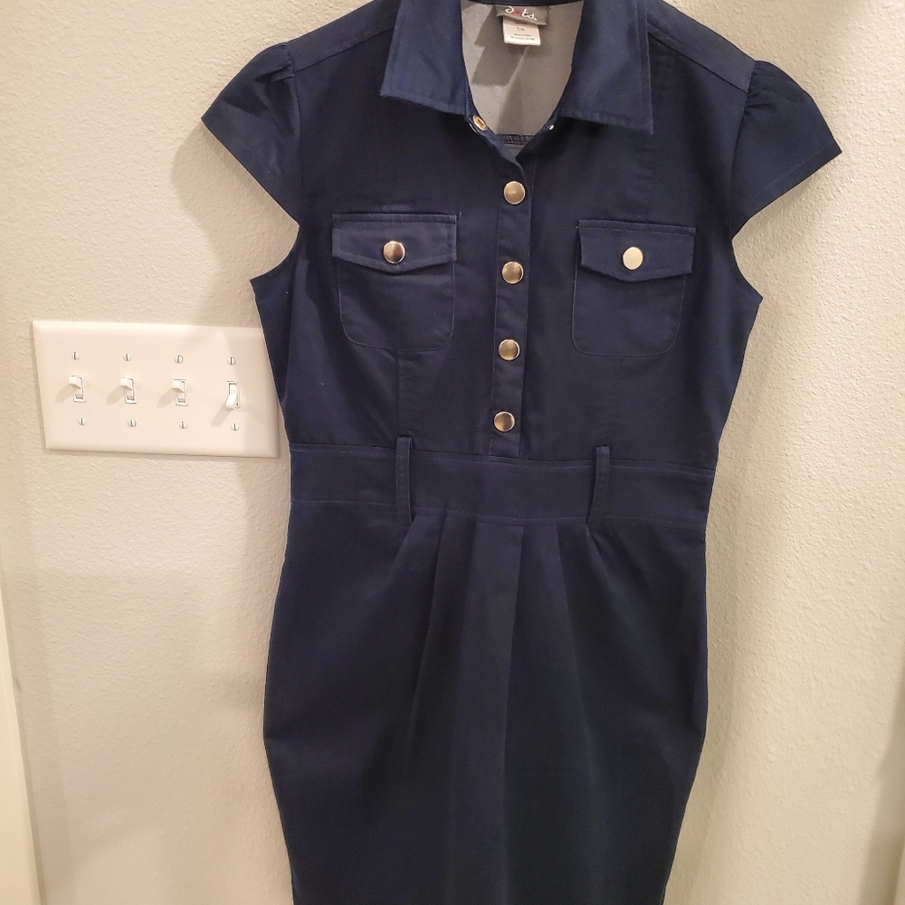 Denim fabric dress gold buttons up front gold buttons on the side. Size 7/8.